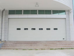 定做安裝沈陽電動卷簾門 保溫車庫門 白鋼卷簾門 電機(jī)維修廠家